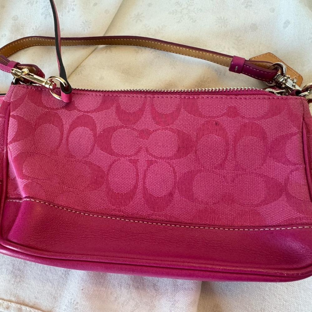 Coach hot pink body bag.